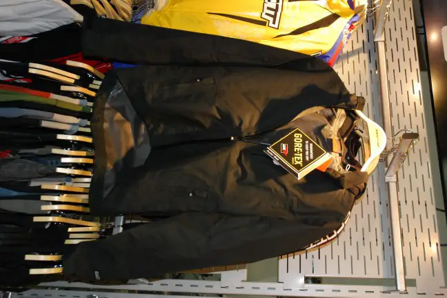 Goretex Paclite jacket. Cycling-cut. Very minimal. We approve. The hood is detachable.