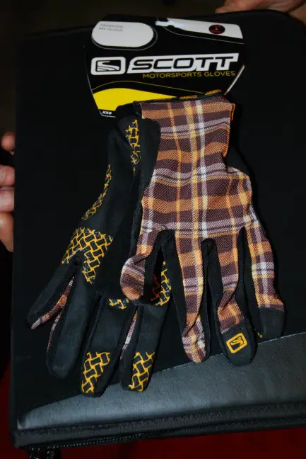 "Interestingly" patterned riding gloves.