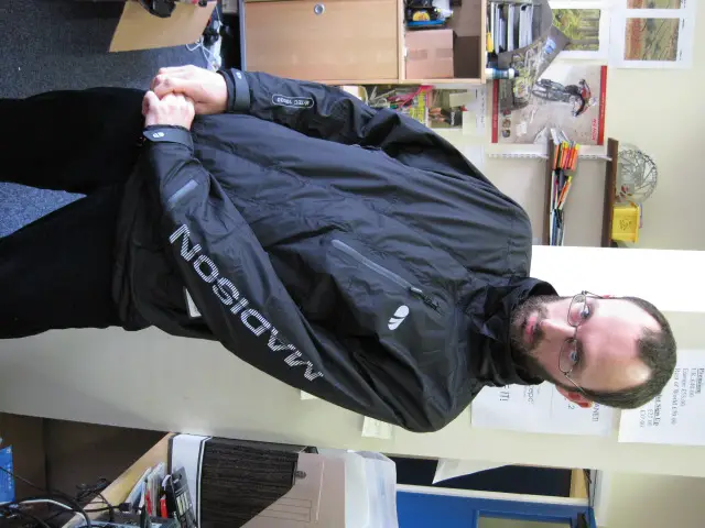 Sideways Benji modeling a Madison Evo jacket.