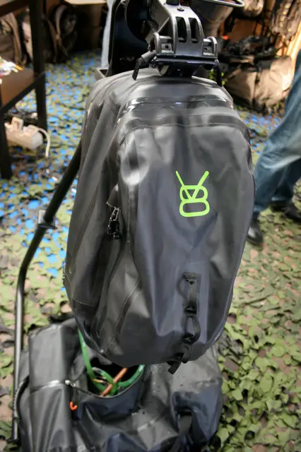 A waterproof bag - it won't go underwater, but it will keep things dry in a rain storm.