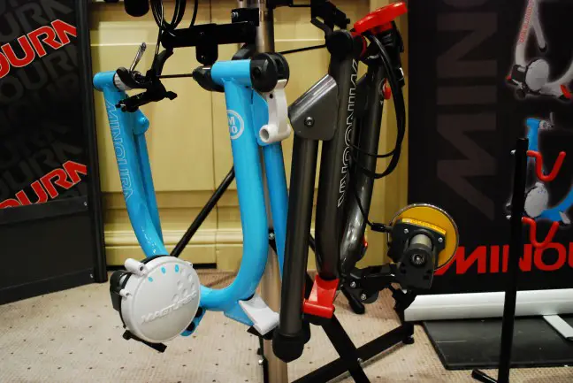 Minoura are trying to de-dullify their turbo trainers by painting them nice colours.