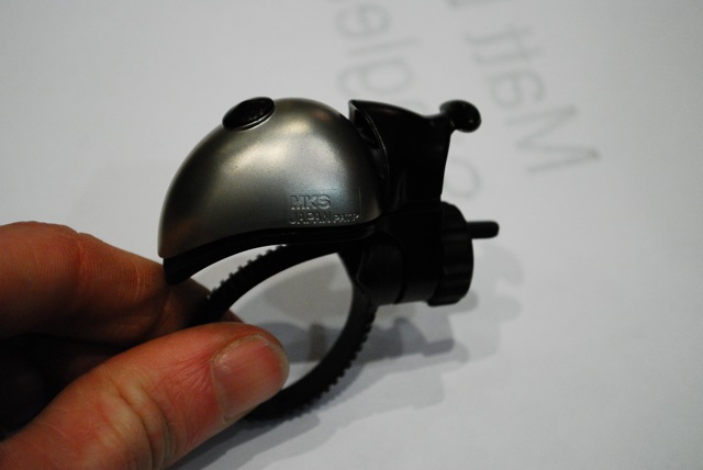 H.R. Giger-esque titanium bell with quickish-release bracket from MKS. It was surprisingly loud.