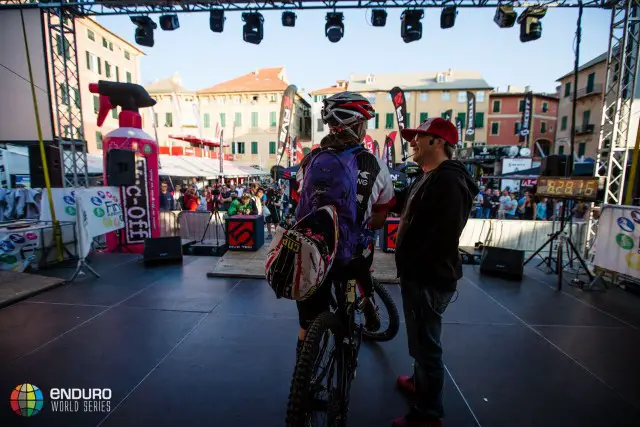 Tracy Mosely gives a pre-race interview with Enrico Guala. EWS 7 2014, Finale Ligure. Photo by Matt Wragg