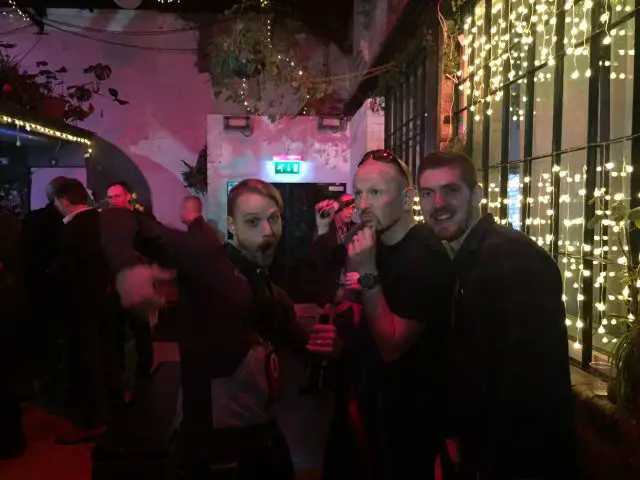 Wil, Rob and Sanny appreciating the free bar at the CMAs