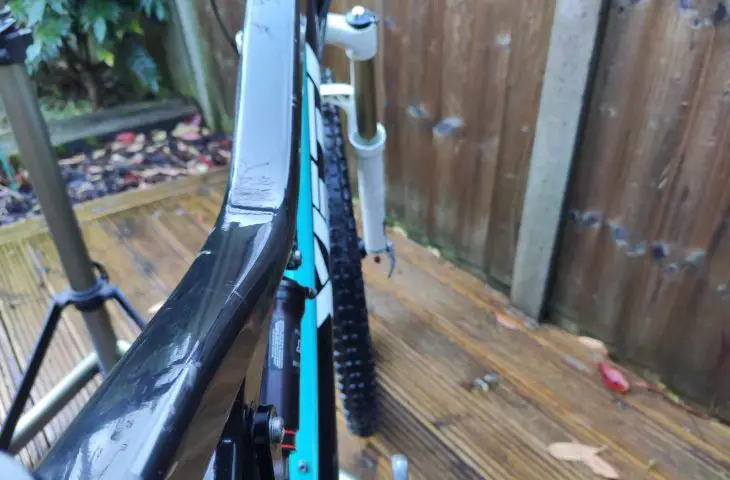 The marks on the left of the top tube are just bubbles under the Invisiframe kit.