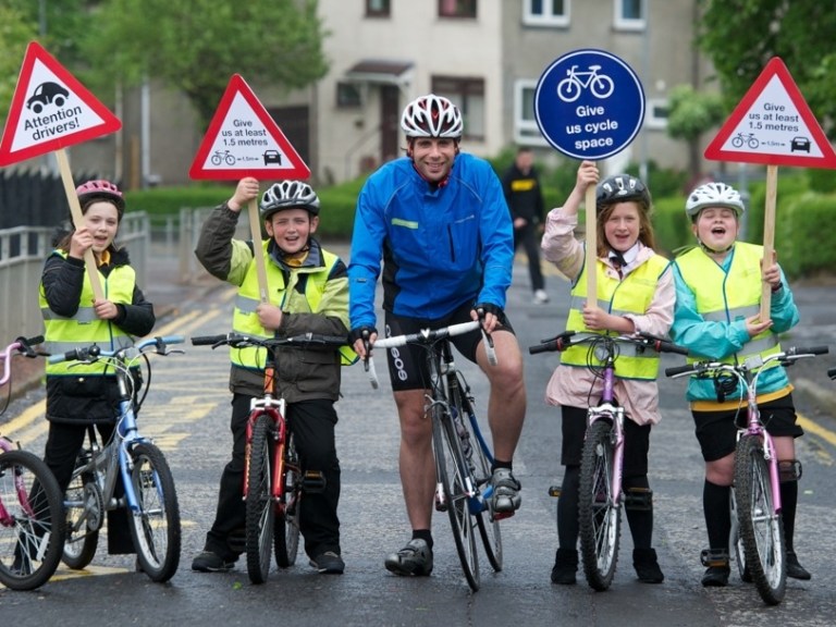 Round the world rider campaigns to help kids cycle to school