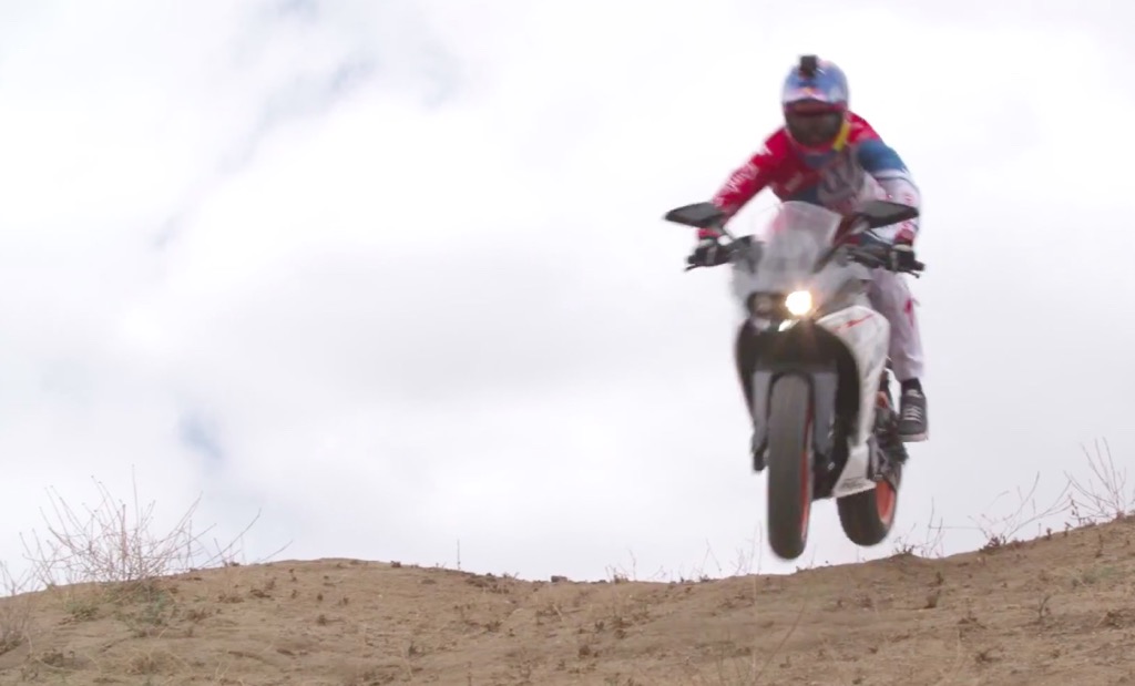 Aaron Gwin rides a KTM motorcycle downhill, CHAINLESS