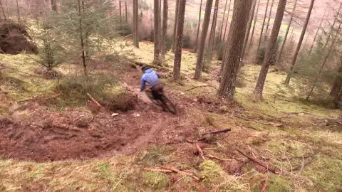 Joe Barnes rides slop mountain.