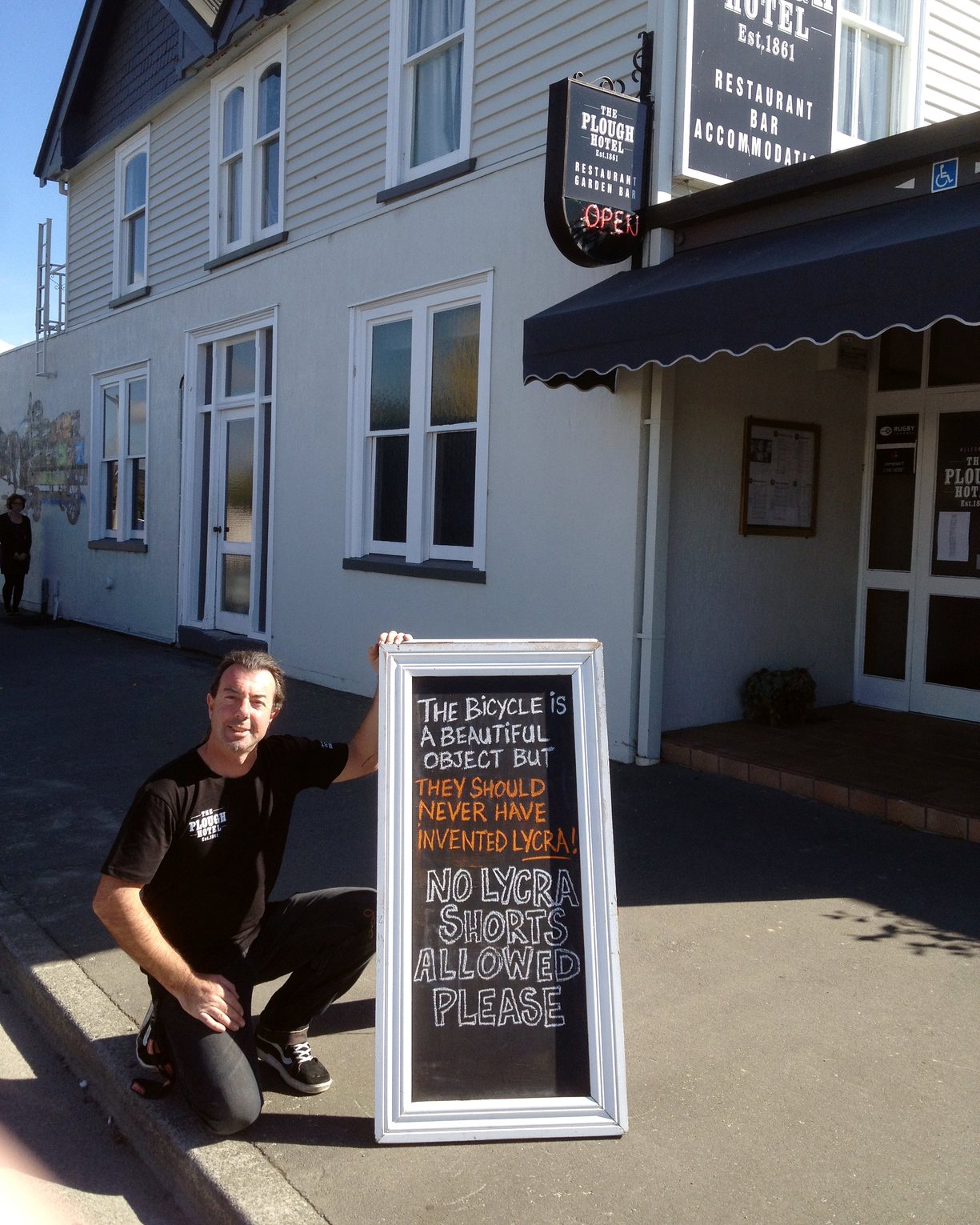 Want coffee? Cover up your lycra…