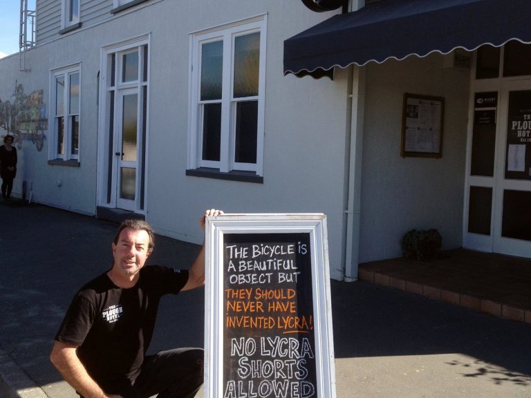 Want coffee? Cover up your lycra…