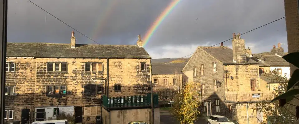 double rainbow office clouds rain