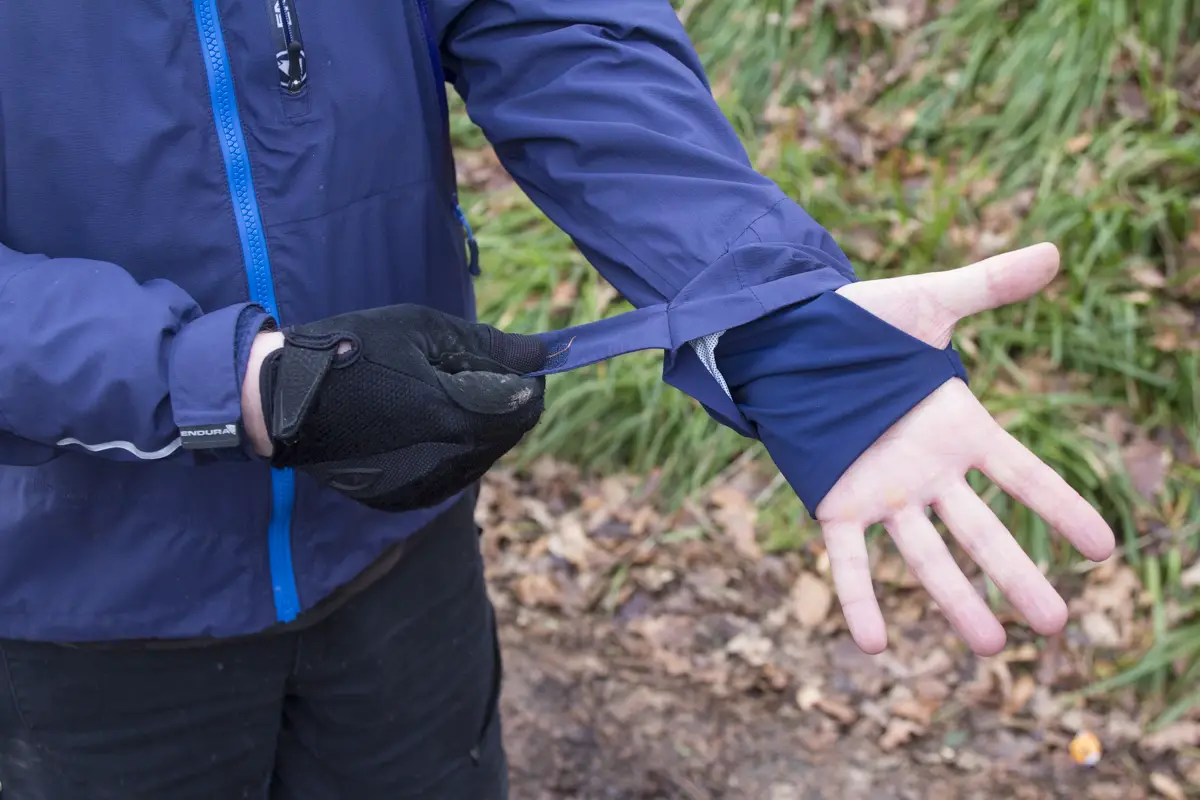 Elastic cuffs with a thumb hole to keep drafts out.