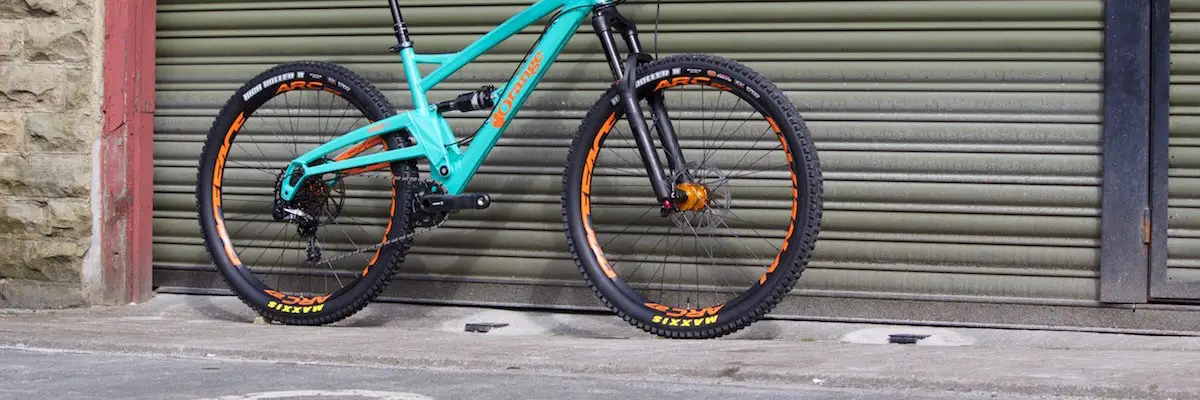 orange four full suspension trail bike