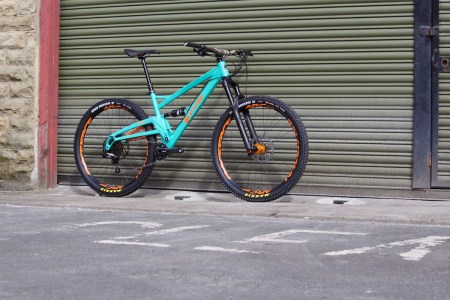 orange four full suspension trail bike