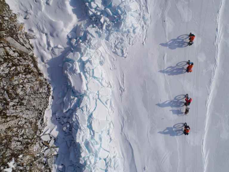 Crossing The Deepest Lake In The World, By Fat Bike, In Midwinter