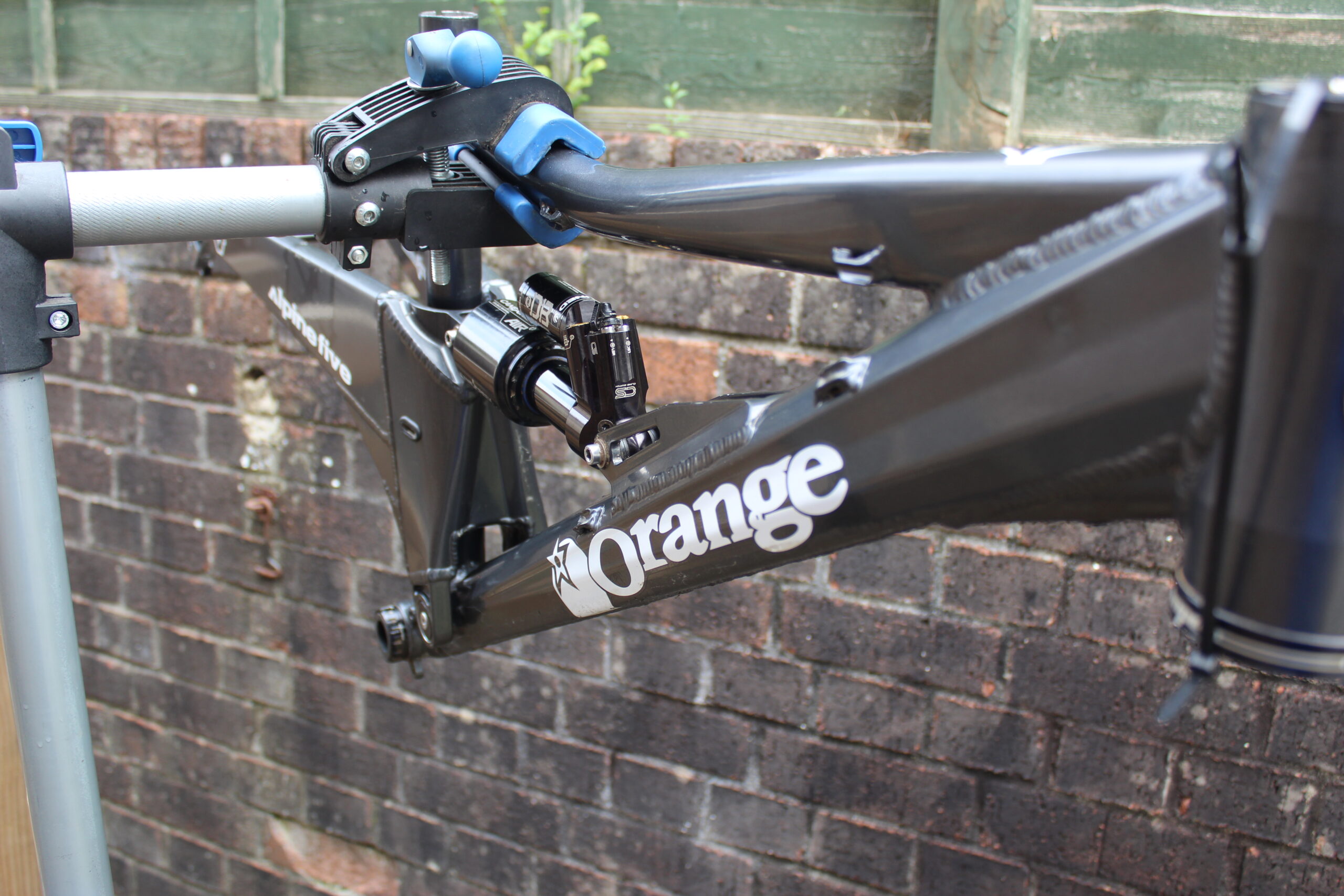 Orange Alpine Five Frame and Cane Creek DB Air Shock