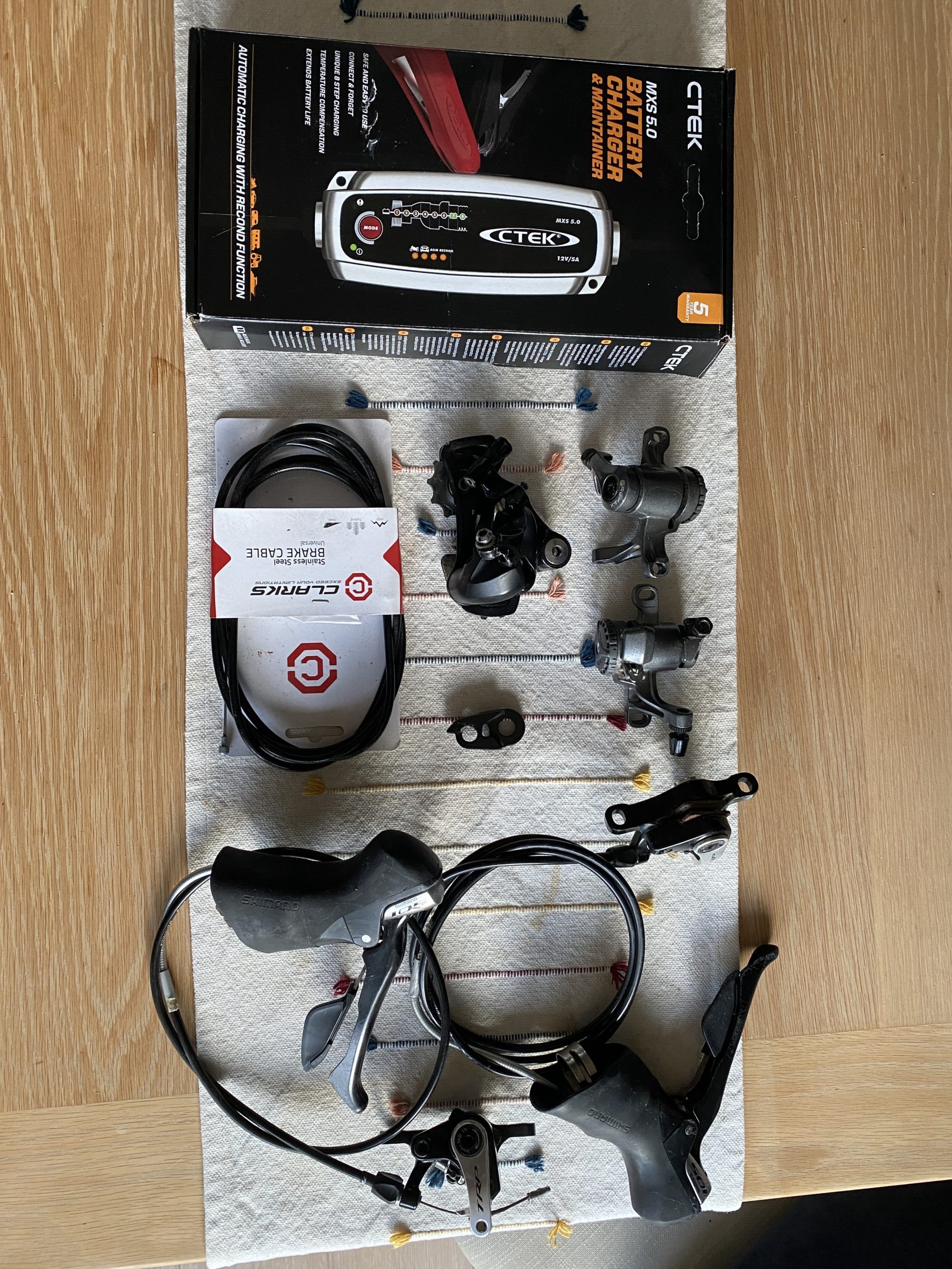 Little clearout: cable disc brakes, 105 mech,  105 shifters, car battery charger…