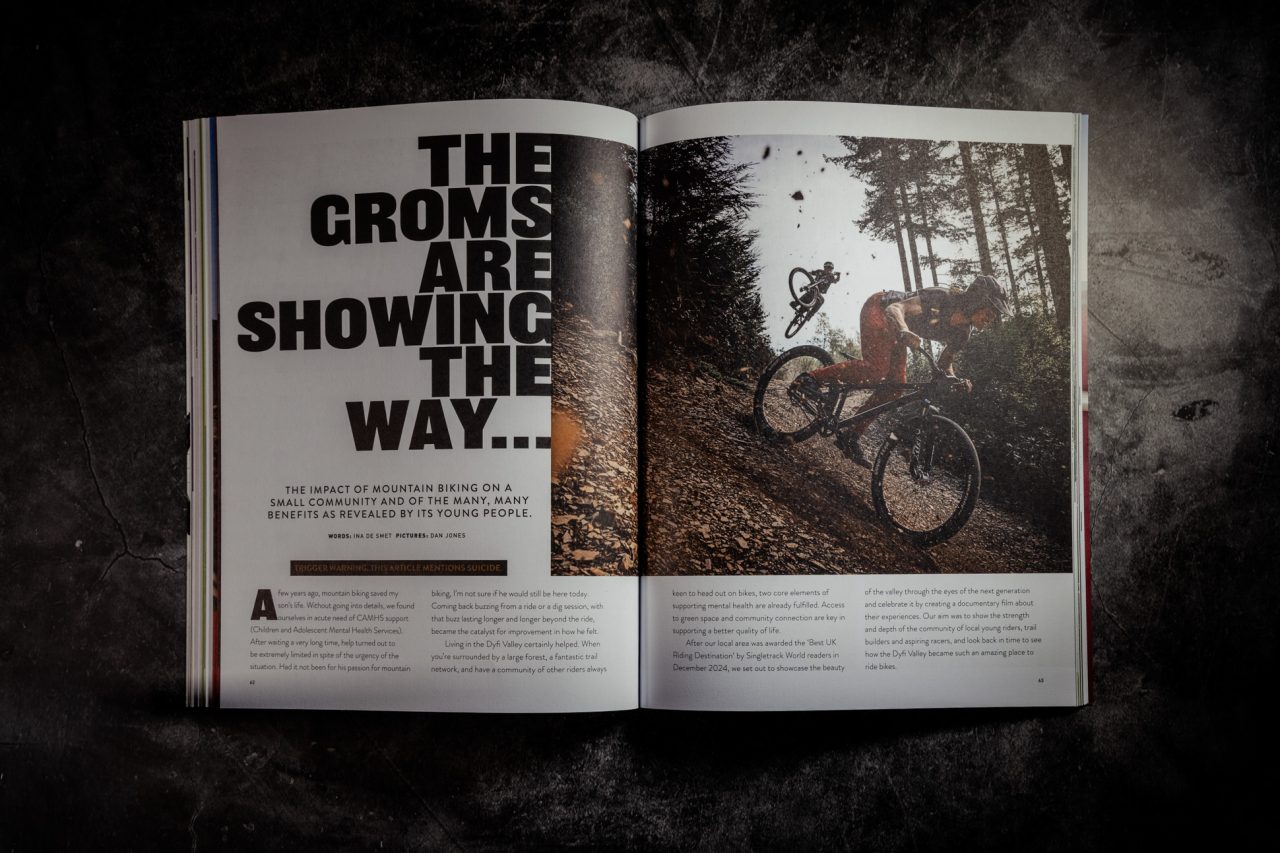 Opening spread of 'The Groms Are Showing The Way' from Singletrack Magazine Issue 167, with an action photo of two young mountain bikers on a forest trail, one airborne behind the other