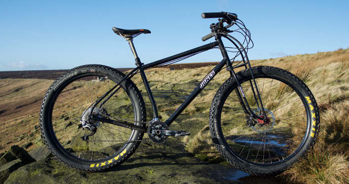 The Jones Plus 29+ steel bike with its distinctive truss fork and swept-back H-bars