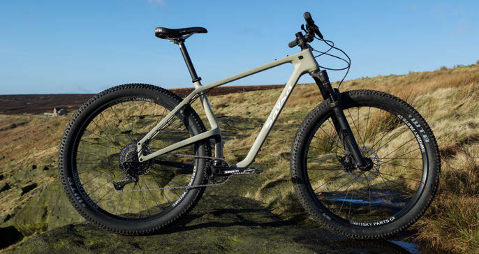The Salsa Woodsmoke 29+ GX1 carbon hardtail with its elevated driveside chainstay