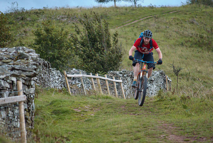 Riders on the exposed ridge above the Usk valley in the Brecon Beacons